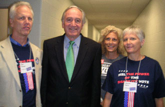 Senator Tom Harkin, of Iowa, shares a special time with Dan Fisher, Rachel Freund, and Lauren Spiro
